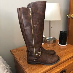 Tall brown hard heel boots